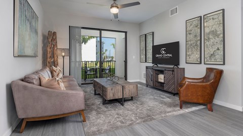 a living room with a couch and a tv